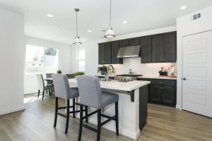 Gourmet kitchens with huge islands are one of the standard features in these popular homes in the San Fernando Valley.