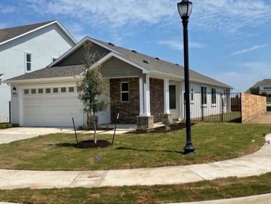 Exterior elevation of Enclave Plan 1, Lot 57, at 1029 Chapote Terrace, Enclave community, Georgetown, Texas